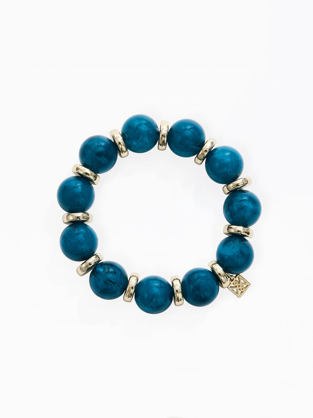 A beaded stretch bracelet featuring round teal-blue beads separated by small metallic gold spacer rings, with a small gold charm at the bottom right, shown on a plain white background.