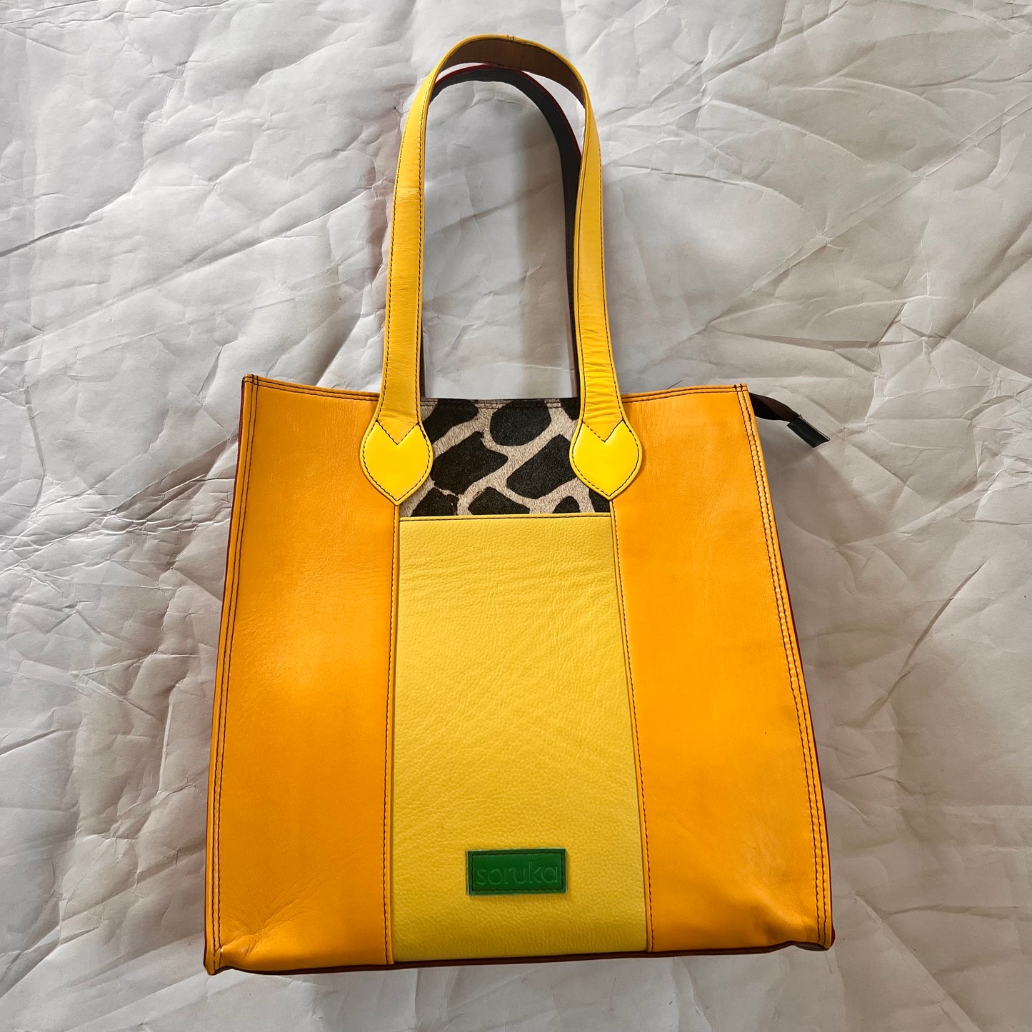 front view of honey with green patch giselle tote.