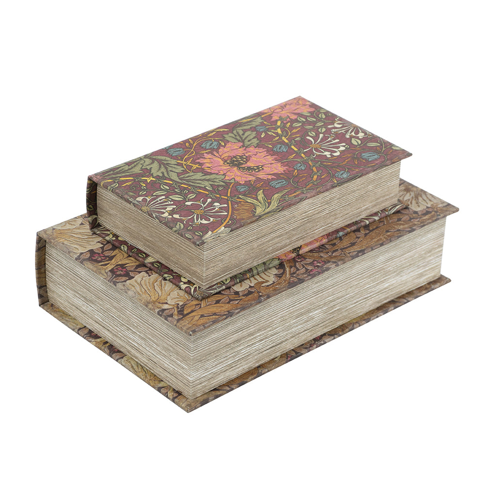 Two stacked book boxes with floral designs stacked on a white background