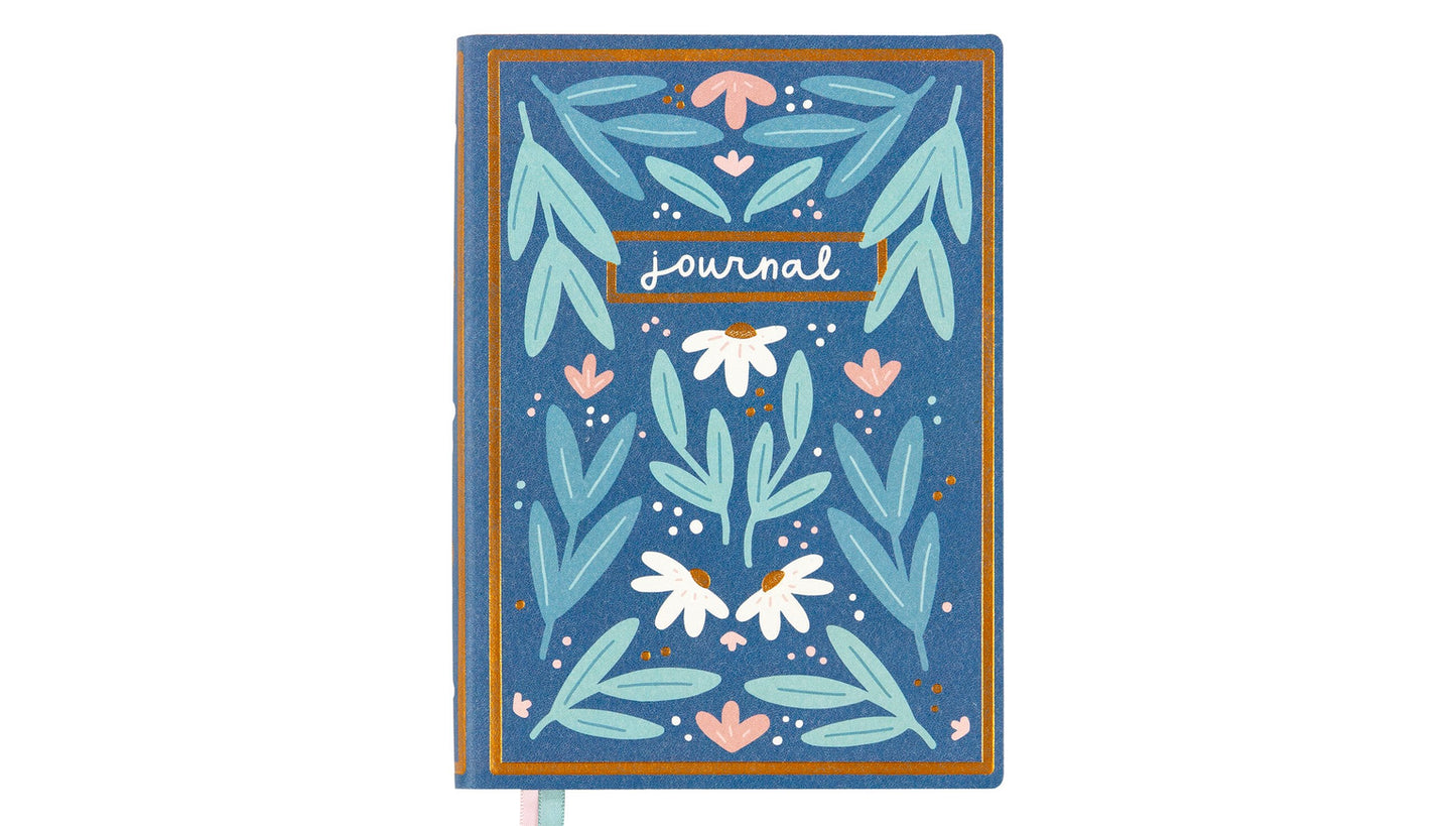 front cover of Blue Book Journal with white and pink floral design