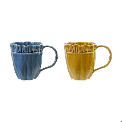 blue and yellow ruffle mugs on a white background