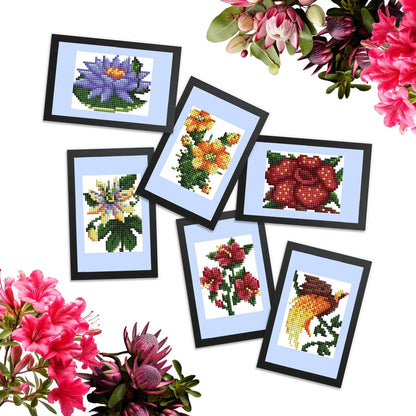 6 completed mini dazzles artworks in assorted florals and one bird design