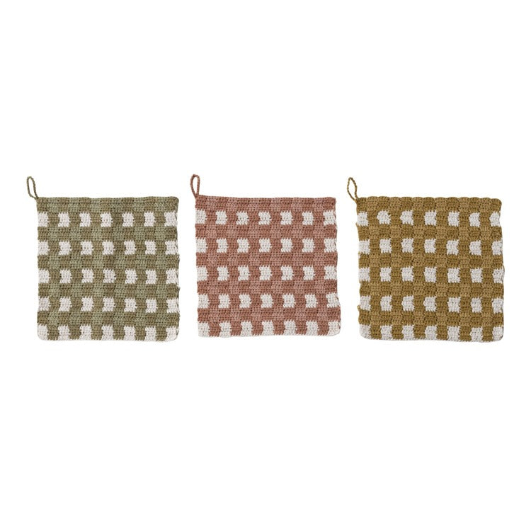 Three pot holders with checkered pattern on a white background