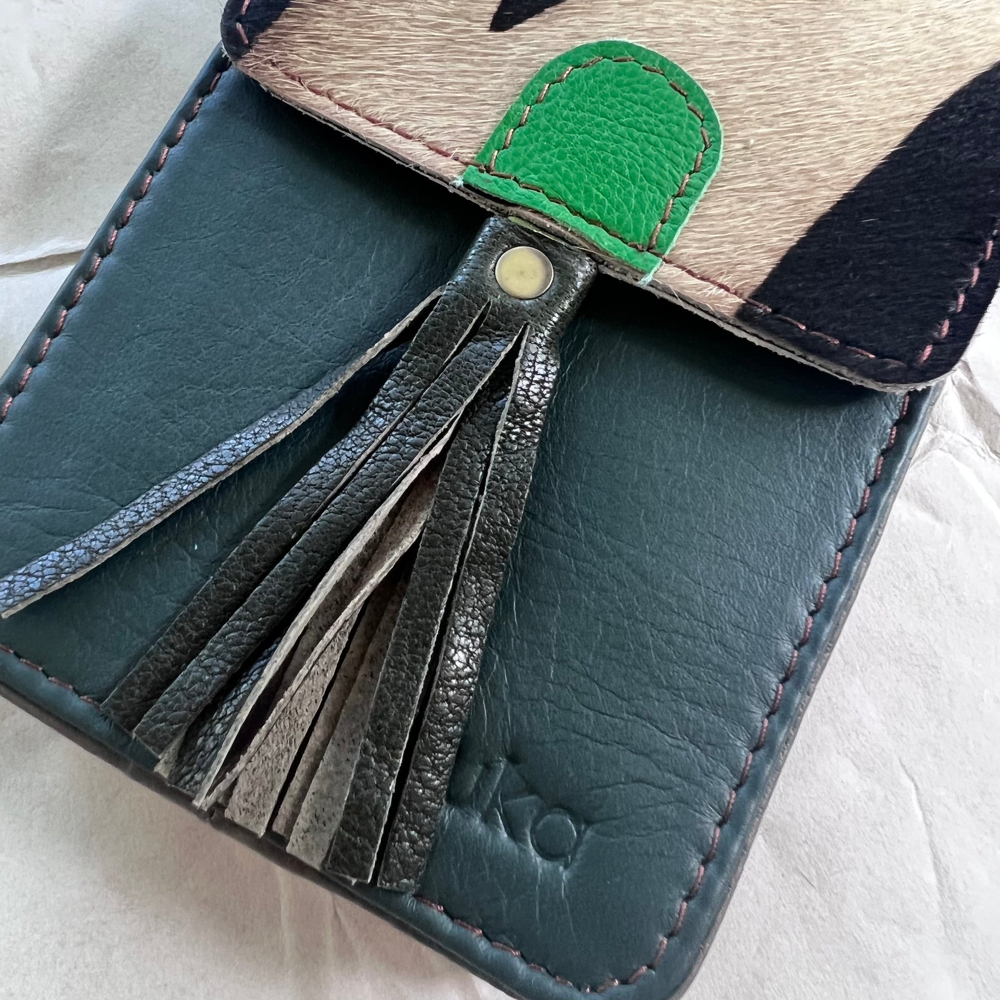 close-up of deep teal Gia Phone Bag