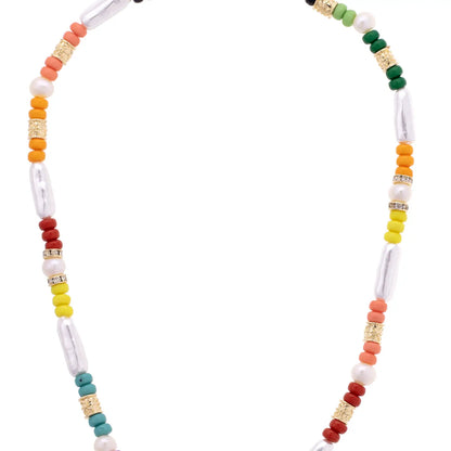 close-up of Colorful beaded necklace on a white background