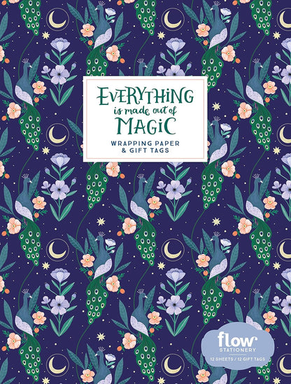 Wrapping paper with magical design featuring foxes, flowers, and moons on a dark blue background.