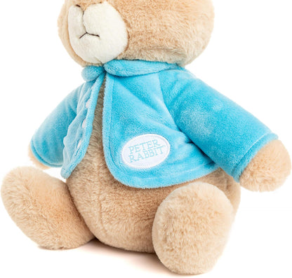 up close view Peter Rabbit's blue jacket with patch saying his name