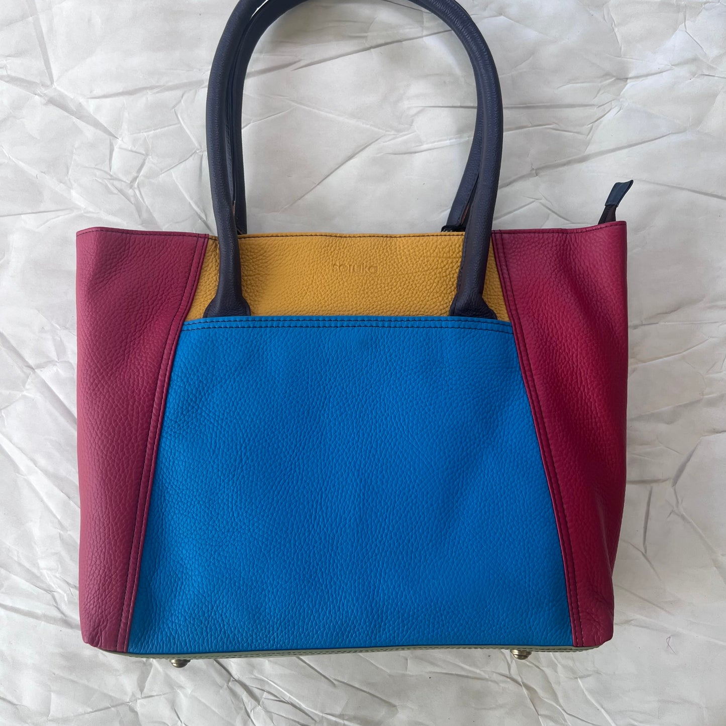 marina sitges tote with color blocks of bright red, blue, and yellow