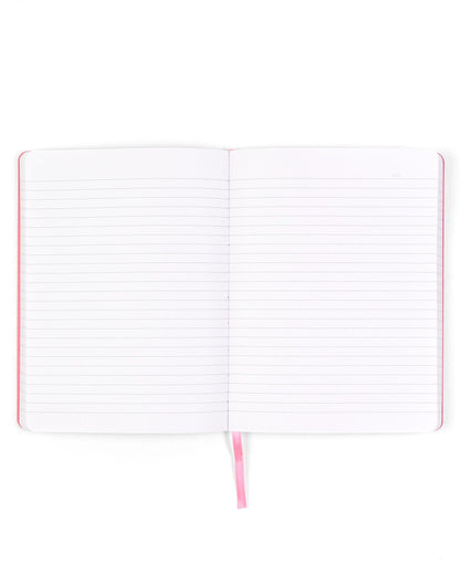 An open lined notebook with white pages and a pink ribbon bookmark