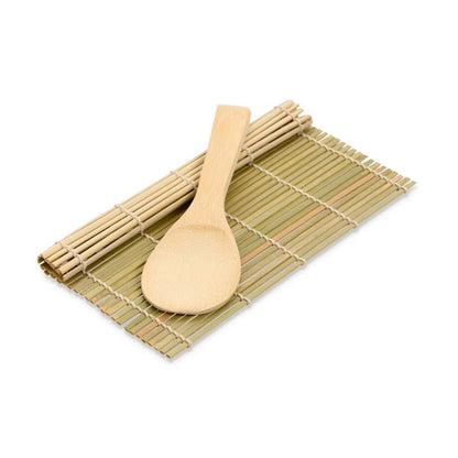 Bamboo mat with spoon on it on a white background