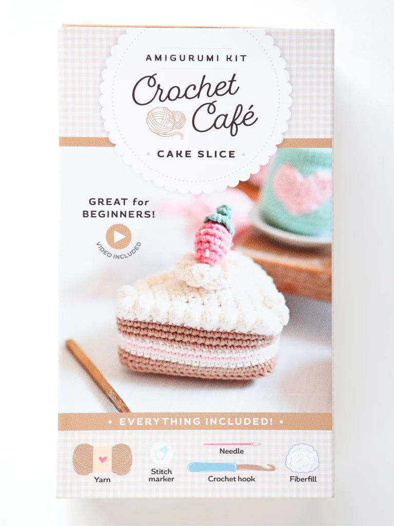 Crochet kit packaging for a cake slice with text 'Amigurumi Kit Crochet Café Cake Slice' on a white background.