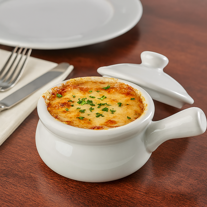 french onion soup bowl filled with soup with melted cheese on top