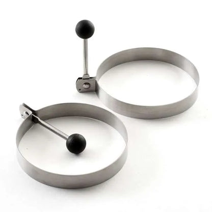 Stainless Steel Egg or Pancake Rings with one of the handles down for storage