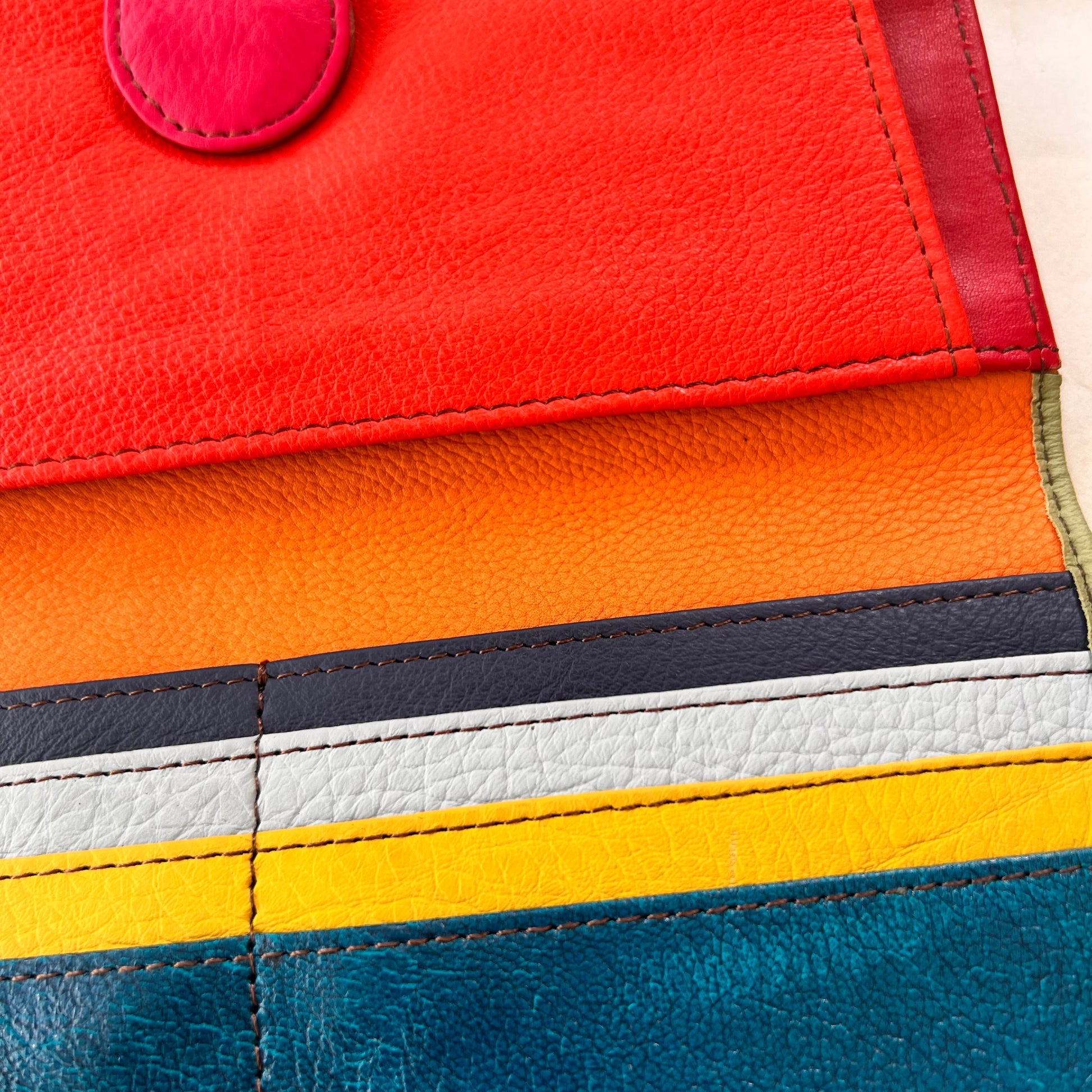 close-up of secret clutch colorful card slots.