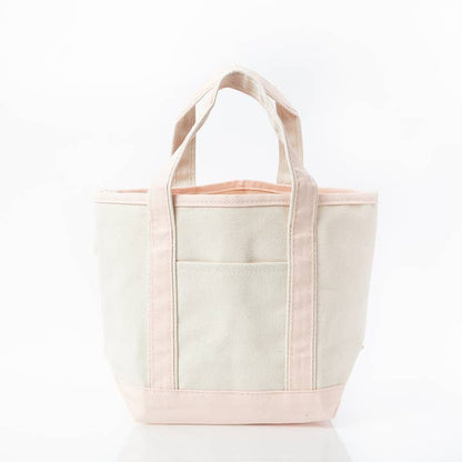 off white tote with pale pink handles and trim