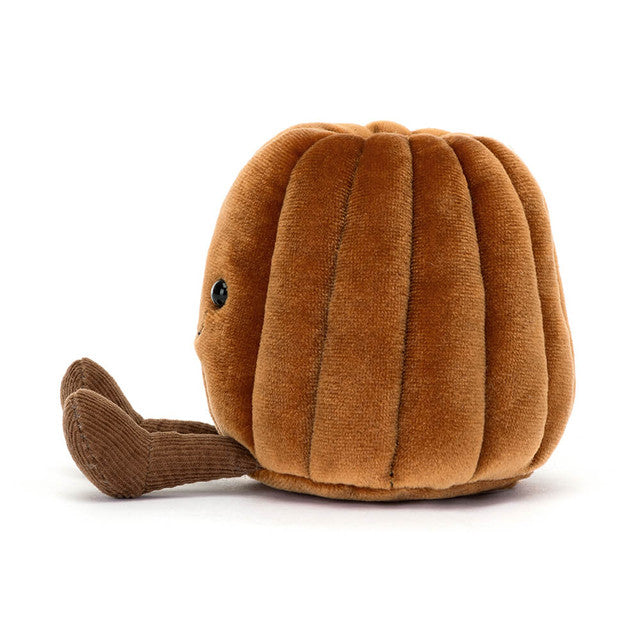 side view of the Amuseables Carole Canelé plush toy