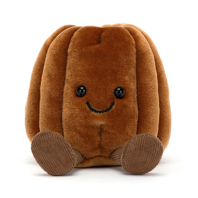 front view of the Amuseables Carole Canelé plush toy