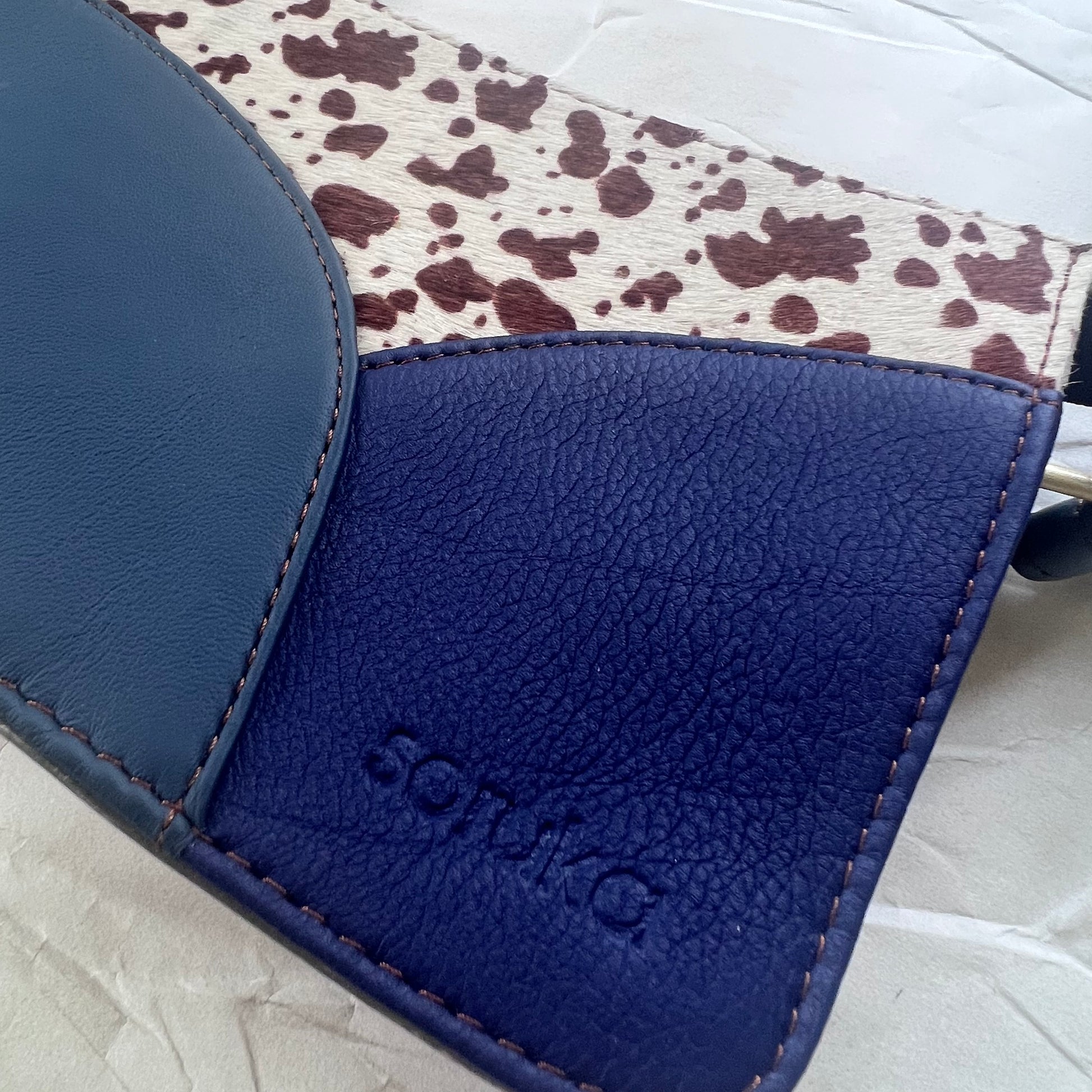 close-up of cerulean Meredith Purse
