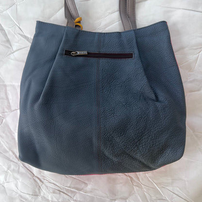 dark grey back of flamingo celine tote