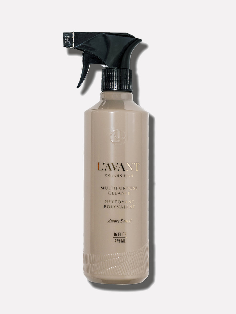 ambre santal cleaner with a tan bottle and black sprayer