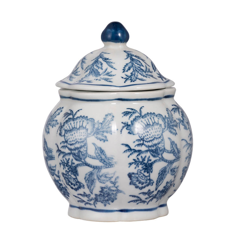 small round white jar with lid and blue flower design