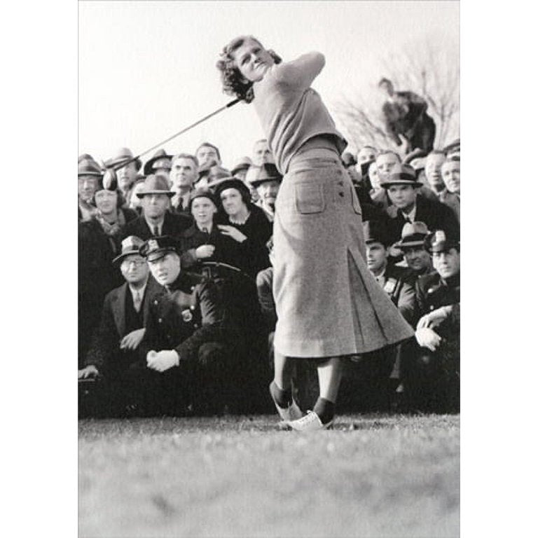 front of card is black and white, antique style woman golfing