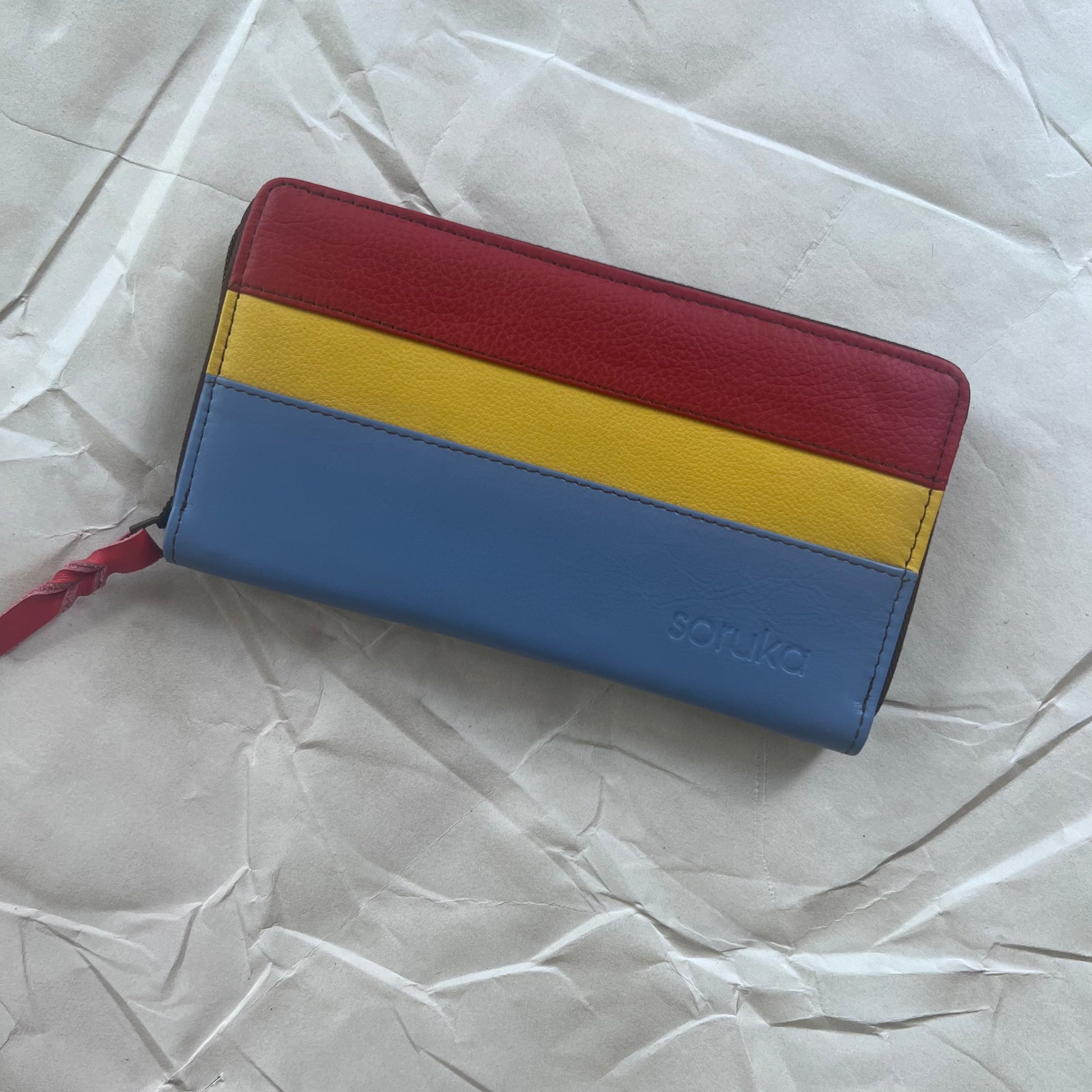 periwinkle Carla Wallet with blue yellow and red stripes