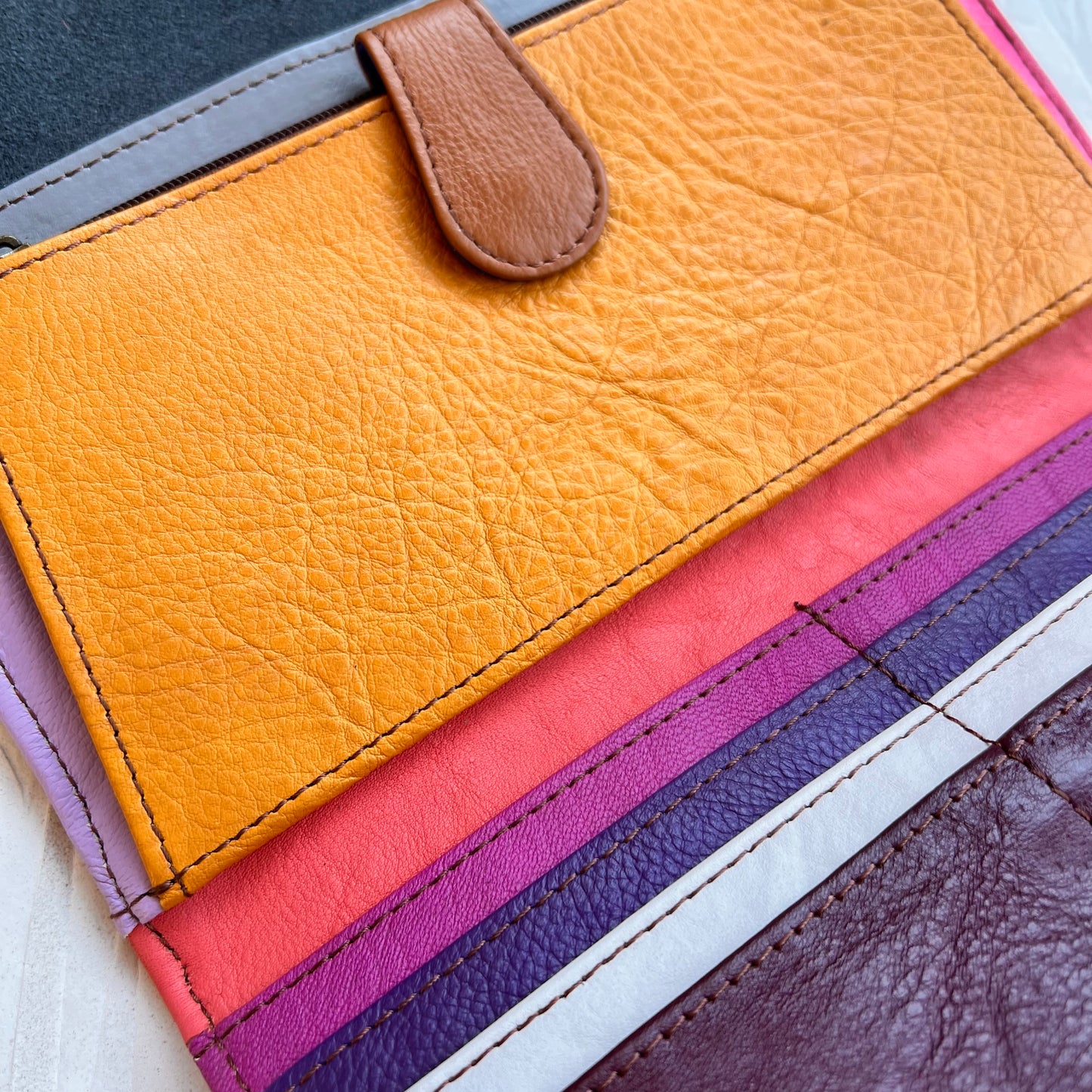 close-up of colorful card slots and other pockets.