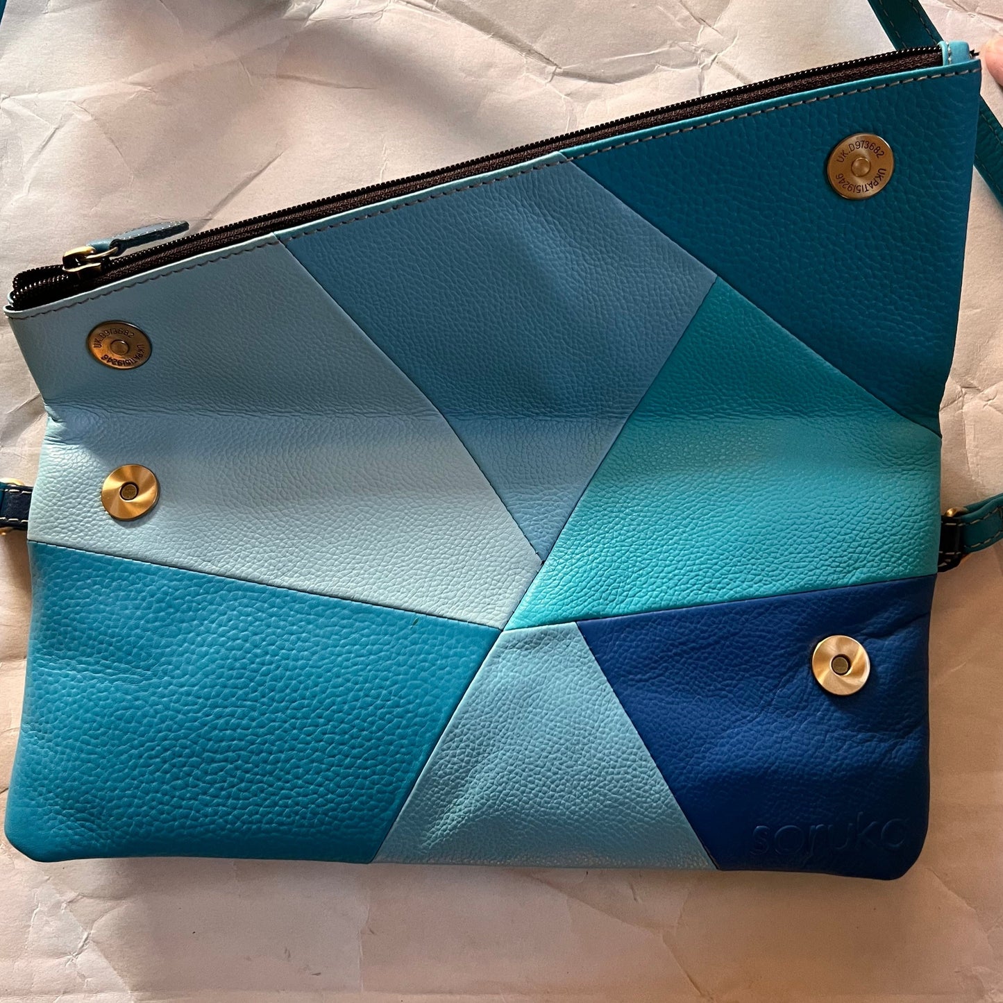 mila purse with flap open.