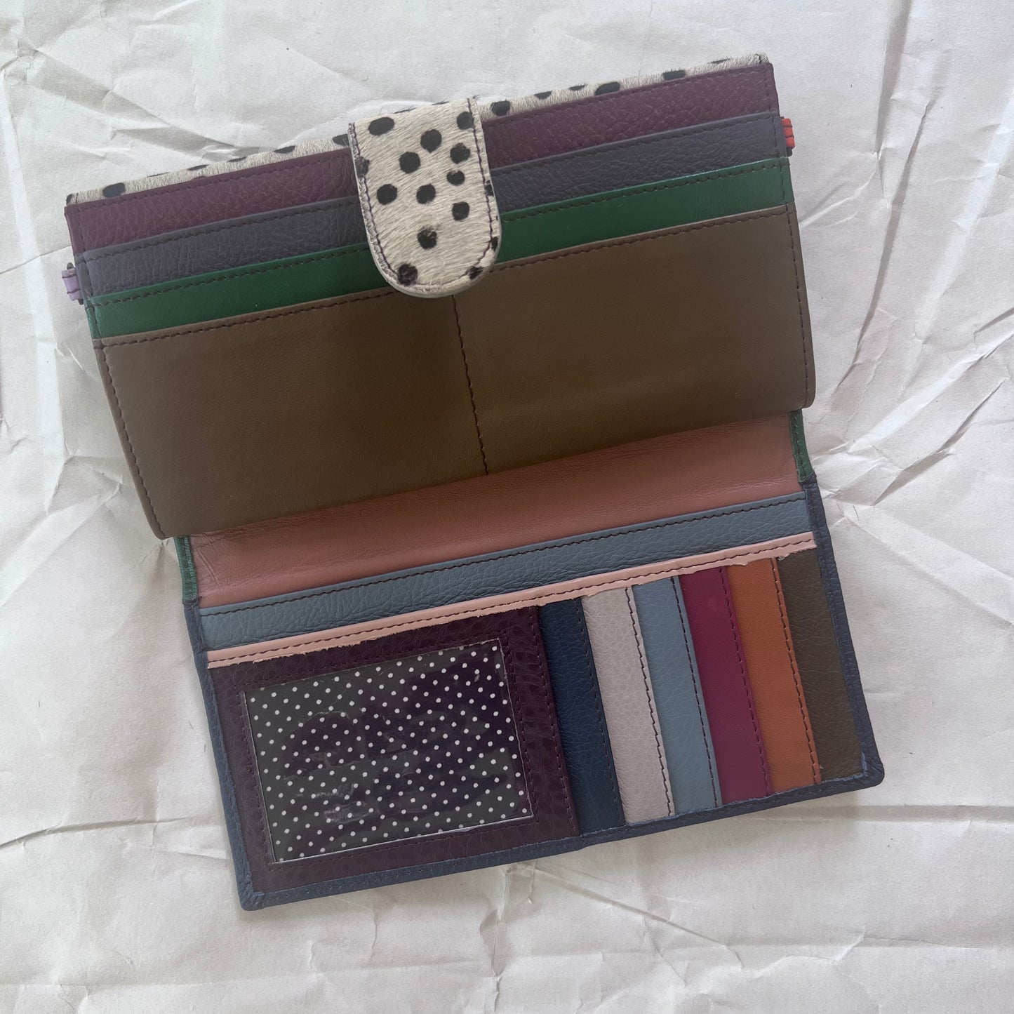interior view of wallet side of Amelia Clutch Wallet with colorful card slots