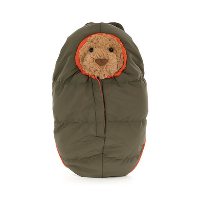 view of Bartholomew Bear Hiking Outfit Plush Toy inside sleeping bag
