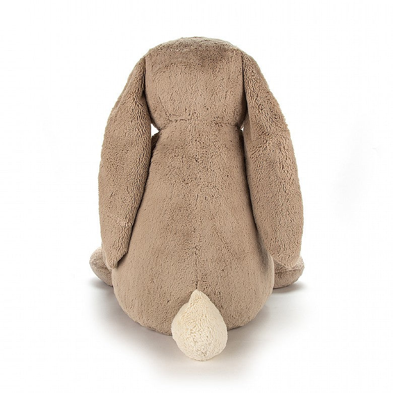 back view of the beige bashful bunny on a white background