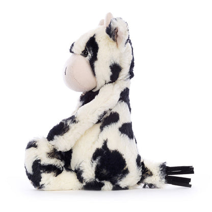 side view of Bashful Calf Plush Toy