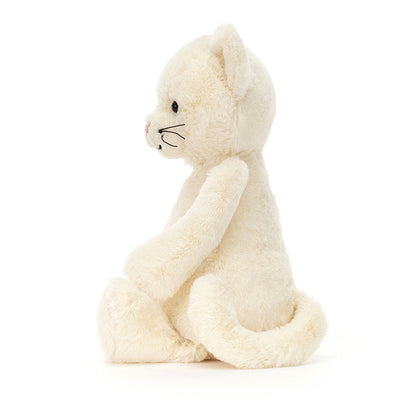 side view of Bashful Cream Kitten Original Plush Toy.