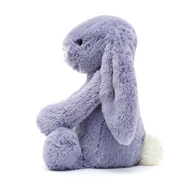 side view of bashful viola bunny plush toy