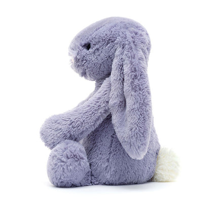 side view of bashful viola bunny plush toy