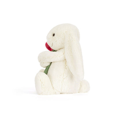 side view of Cream Bunny With Rose Plush Toy