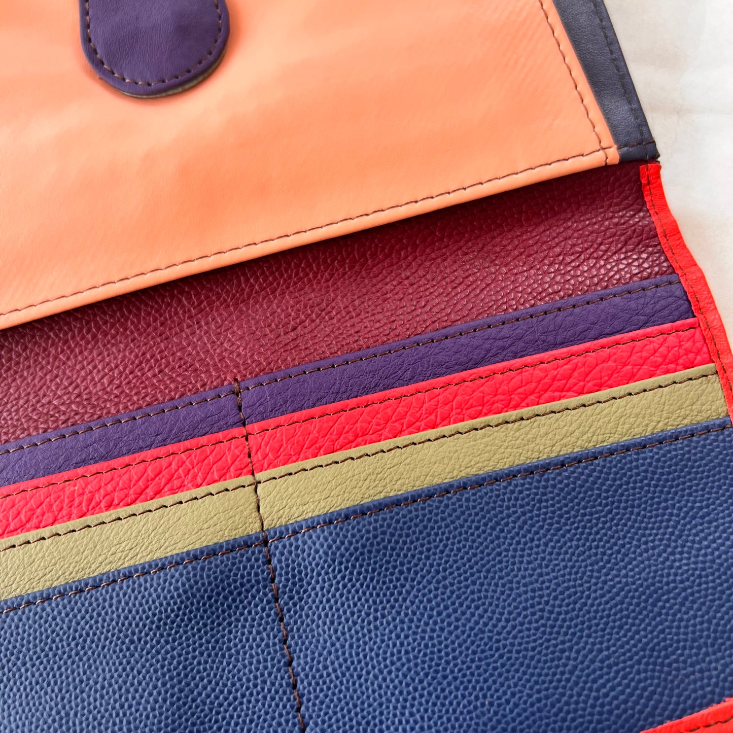 close-up of secret clutch colorful card slots.