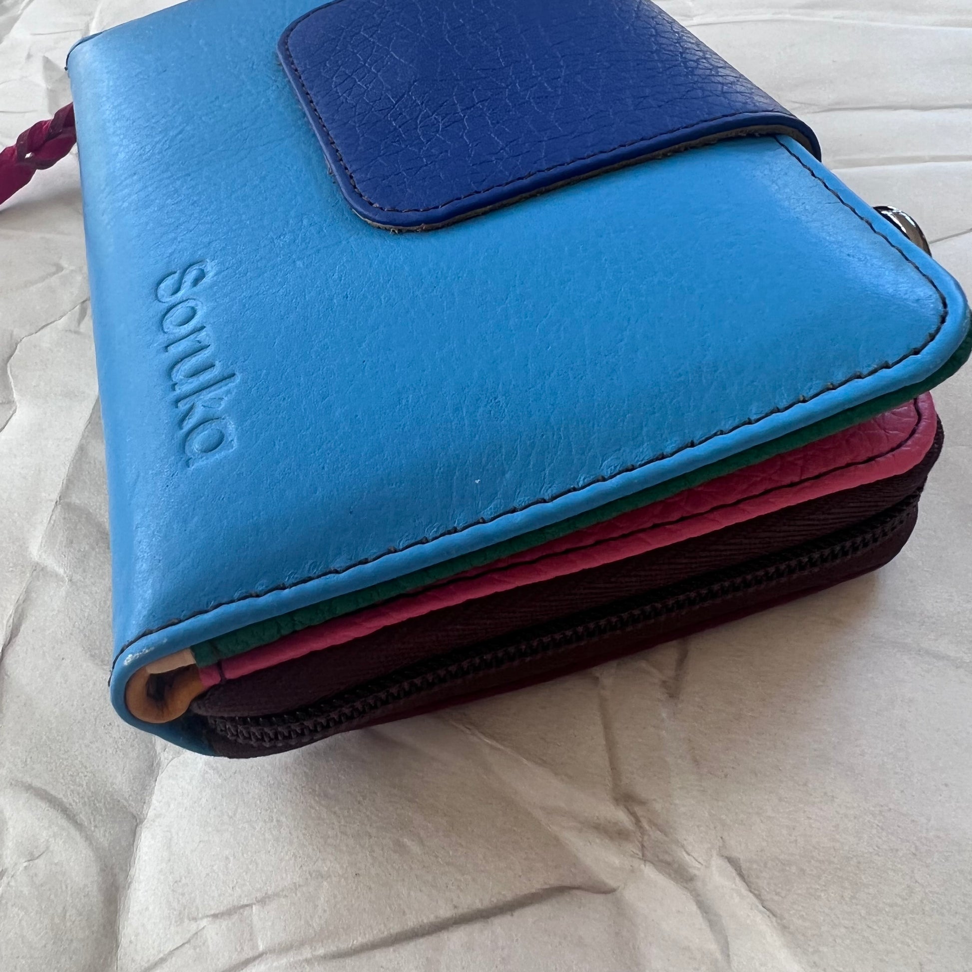 side view of blue Beatrice Clutch