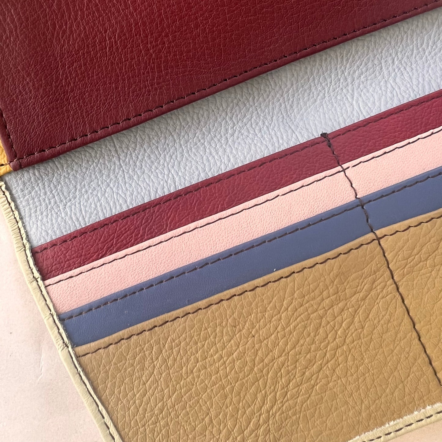 close-up of secret clutch colorful card slots.