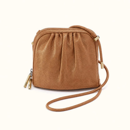 Isabella crossbody in honey gold on a white background