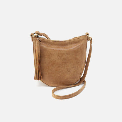Brown leather crossbody bag on a white background