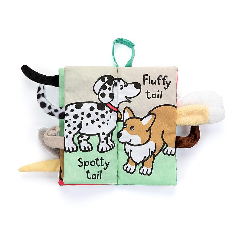 inside view of Puppy Tails Soft Cloth Baby Book with two different dogs and displayed against a white background