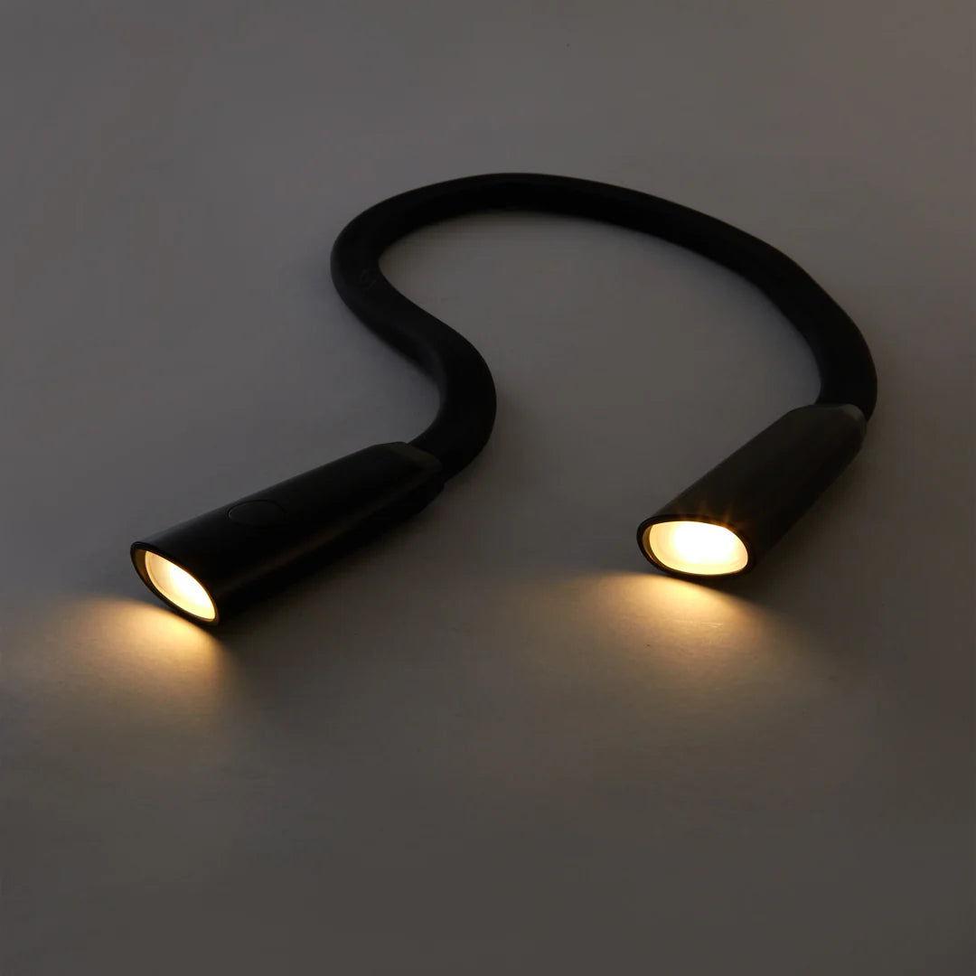 flexible neck lamp with amber lights on.