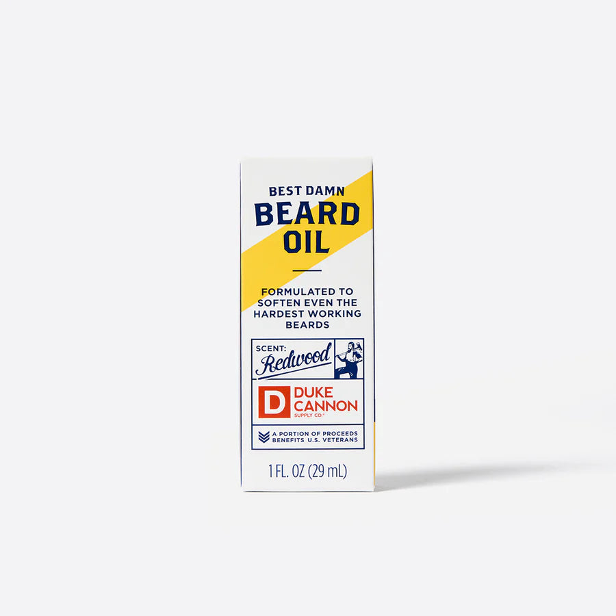 Beard oil packaging with Duke Cannon branding on a white background