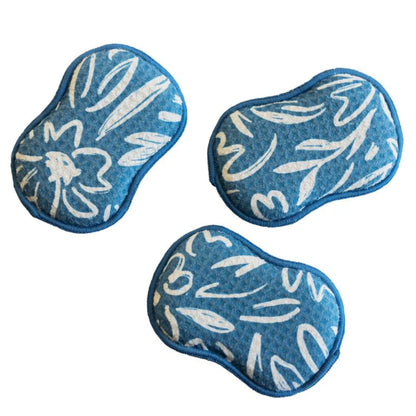 3 blue reusable sponges with white floral patterns arranged on a white background.