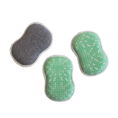 3 sponges with one flipped over showing grey scrubbing surface.