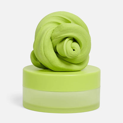 Green textured calming putty on a white background