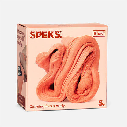 Box of Speks calming focus putty with a pinkish-orange color on a white background