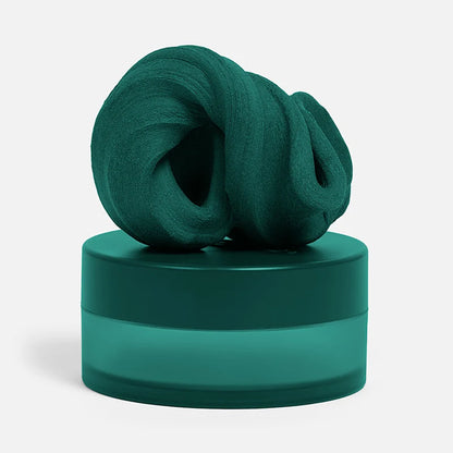 dark green fidget putty set on its container shown on a white background